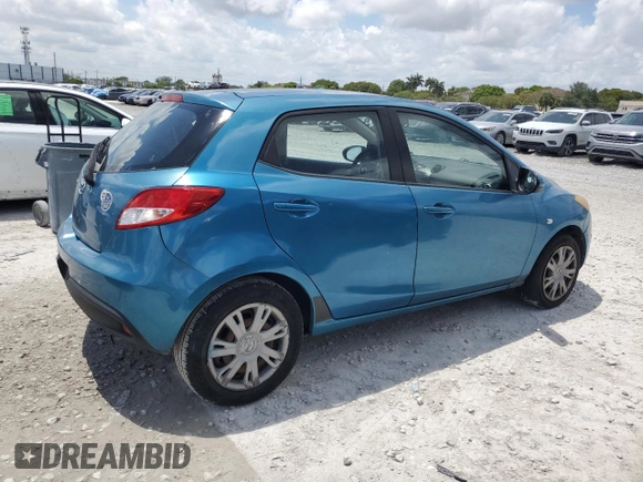 2011 Mazda 2 Sport with VIN JM1DE1HY0B0122590, listed as a Copart auction lot 56162515 with 140,847 mi miles and Clean Title. Bid and sale history available at DreamBid. Image 3.