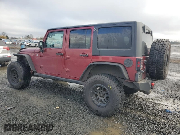 2012 Jeep Wrangler Unlimited Rubicon with VIN 1C4HJWFG2CL219021, listed as a Copart auction lot 87451784 with 109,675 mi miles and Salvage title. Bid and sale history available at DreamBid. Image 2.