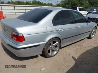 2003 BMW 5 Series 540i z VIN WBADN63443GS56672, wystawiony jako IAAI lot #42388726 z przebiegiem Nie podano mil oraz . Historia ofert i sprzedaży dostępna na DreamBid. Obrazek 4.