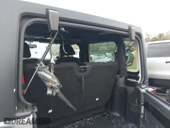 2014 Jeep Wrangler Sport with VIN 1C4AJWAG0EL265409, listed as a IAAI auction lot 41726935 with 78,547 mi miles and . Bid and sale history available at DreamBid. Image 6.