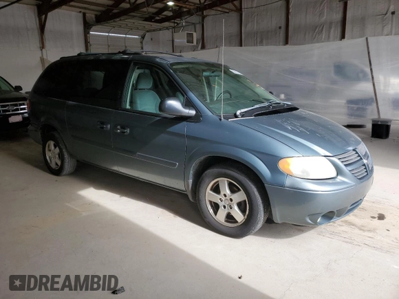 2005 Dodge Caravan SXT with VIN 2D4GP44L95R462451, listed as a Copart auction lot 50413125 with 148,573 mi miles and Salvage title. Bid and sale history available at DreamBid. Image 4.