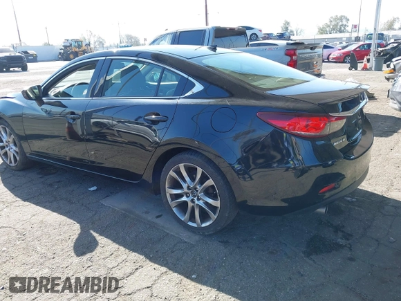 2015 Mazda 6 i Grand Touring with VIN JM1GJ1W61F1165006, listed as a IAAI auction lot 41988778 with 113,226 mi miles and . Bid and sale history available at carsss.com. Image 3.