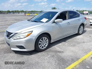 2016 Nissan Altima 2.5 S with VIN 1N4AL3AP1GN320391, listed as a IAAI auction lot 42207672 with 129,754 mi miles. Bid and sale history available at carsss.com. Image 2.