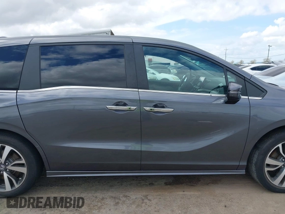 2023 Honda Odyssey Touring with VIN 5FNRL6H81PB047495, listed as a IAAI auction lot 41919967 with Not Provided miles and . Bid and sale history available at DreamBid. Image 14.