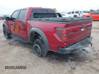 2014 Ford F-150 SVT Raptor with VIN 1FTFW1R61EFC00041, listed as a IAAI auction lot 41609376 with 119,325 mi miles and . Bid and sale history available at carsss.com. Image 3.