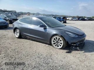 2020 Tesla Model 3 Standard Range Plus z VIN 5YJ3E1EA0LF717655, wystawiony jako Copart lot #51426325 z przebiegiem 34 730 mil mil oraz Szkoda całkowita • Salvage title. Historia ofert i sprzedaży dostępna na DreamBid. Obrazek 4.