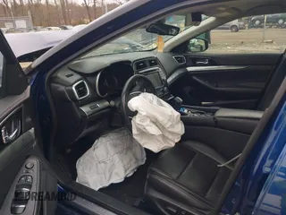 2021 Nissan Maxima SV with VIN 1N4AA6CV6MC507605, listed as a IAAI auction lot 41816971 with 63,513 mi miles and . Bid and sale history available at DreamBid. Image 5.