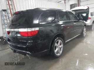 2012 Dodge Durango Citadel with VIN 1C4RDJEG8CC292006, listed as a IAAI auction lot 41553408 with 147,954 mi miles and . Bid and sale history available at DreamBid. Image 4.