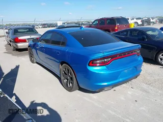 2015 Dodge Charger SXT with VIN 2C3CDXHG1FH866598, listed as a IAAI auction lot 41944761 with 201,163 mi miles and . Bid and sale history available at DreamBid. Image 3.