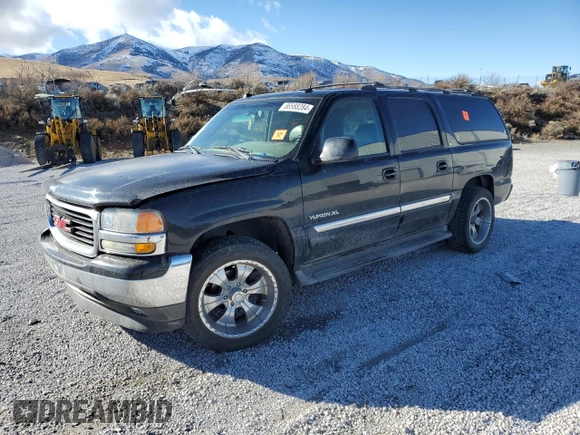2005 GMC Yukon XL SLE with VIN 1GKEC16Z75J152954, listed as a Copart auction lot 86588284 with 164,185 mi miles and Salvage Title. Bid and sale history available at DreamBid. Image 1.