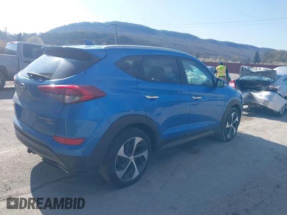 2016 Hyundai Tucson Eco with VIN KM8J3CA24GU054350, listed as a IAAI auction lot 41983769 with 132,424 mi miles. Bid and sale history available at carsss.com. Image 4.