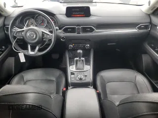 2017 Mazda CX-5 Grand Touring with VIN JM3KFBDL4H0163339, listed as a Copart auction lot 50566495 with 83,453 mi miles and Salvage Title. Bid and sale history available at carsss.com. Image 8.