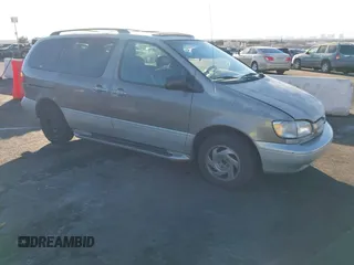 1998 Toyota Sienna LE z VIN 4T3ZF13C1WU051030, wystawiony jako IAAI lot #41259605 z przebiegiem 190 861 mil mil oraz . Historia ofert i sprzedaży dostępna na DreamBid. Obrazek 13.