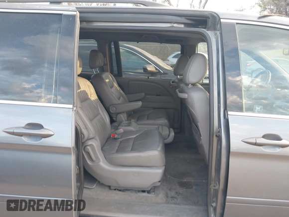 2010 Honda Odyssey EX-L with VIN 5FNRL3H70AB074913, listed as a IAAI auction lot 40142162 with 210,771 mi miles and . Bid and sale history available at DreamBid. Image 8.