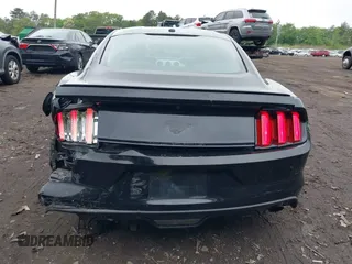 2016 Ford Mustang EcoBoost z VIN 1FA6P8TH8G5221774, wystawiony jako IAAI lot #42275505 z przebiegiem 111 115 mil mil oraz . Historia ofert i sprzedaży dostępna na DreamBid. Obrazek 16.