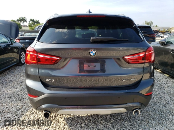 2021 BMW X1 xDrive28i with VIN WBXJG9C09M5T96327, listed as a Copart auction lot 49876493 with 42,572 mi miles and . Bid and sale history available at DreamBid. Image 6.