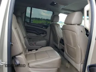 2015 Chevrolet Suburban LT z VIN 1GNSCJKC3FR652426, wystawiony jako Copart lot #60554405 z przebiegiem 200 570 mil mil oraz Szkoda całkowita • Salvage title. Historia ofert i sprzedaży dostępna na DreamBid. Obrazek 11.
