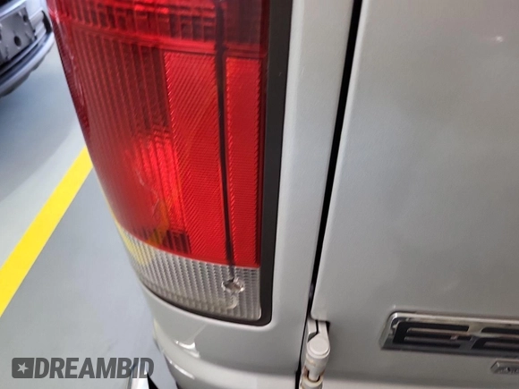 2013 Ford Econoline Cargo with VIN 1FTNS2EL5DDA38031, listed as a IAAI auction lot 42731967 with 116,056 mi miles and . Bid and sale history available at DreamBid. Image 6.