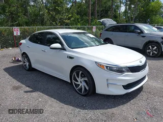 2018 Kia Optima LX z VIN 5XXGT4L39JG272694, wystawiony jako IAAI lot #42155363 z przebiegiem 115 417 mil mil oraz . Historia ofert i sprzedaży dostępna na DreamBid. Obrazek 1.