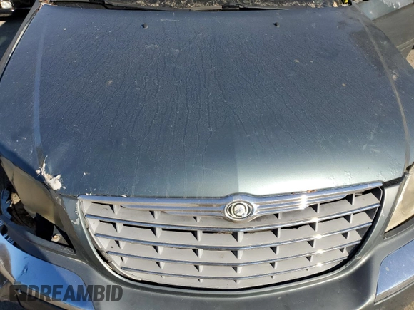 2005 Chrysler Pacifica z VIN 2C8GF78405R471204, wystawiony jako Copart lot #79471964 z przebiegiem Nie podano mil oraz Szkoda całkowita • Salvage title. Historia ofert i sprzedaży dostępna na DreamBid. Obrazek 11.
