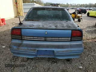 1994 Oldsmobile Cutlass z VIN 1G3WH55M1RD353266, wystawiony jako Copart lot #74058544 z przebiegiem 157 494 mil mil oraz Szkody całkowita. Historia ofert i sprzedaży dostępna na DreamBid. Obrazek 6.