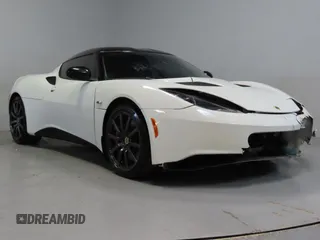 2014 Lotus Evora 2+2 z VIN SCCLMDTU5EHA10041, wystawiony jako Copart lot #50226365 z przebiegiem 26 179 mil mil oraz Szkody całkowita. Historia ofert i sprzedaży dostępna na DreamBid. Obrazek 1.
