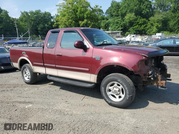 1998 Ford F-150 with VIN 1FTZX18W8WNB76999, listed as a Copart auction lot 59845595 with 135,063 mi miles and Salvage title. Bid and sale history available at DreamBid. Image 4.