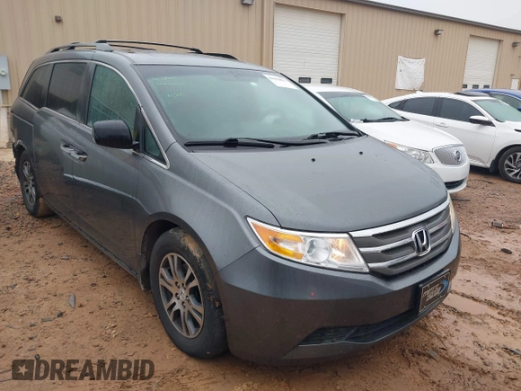 2011 Honda Odyssey EX-L with VIN 5FNRL5H66BB103352, listed as a IAAI auction lot 41901832 with 238,727 mi miles and . Bid and sale history available at carsss.com. Image 1.