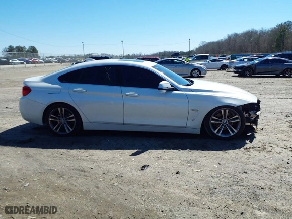 2019 BMW 4 Series 430i with VIN WBA4J1C50KBM14346, listed as a IAAI auction lot 41770469 with 87,026 mi miles. Bid and sale history available at carsss.com. Image 14.