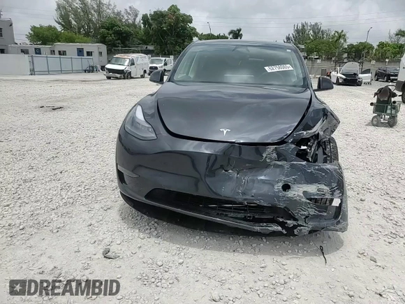 2024 Tesla Model Y Long Range с VIN 7SAYGDEE7RA279293, выставлен на аукционе Copart как лот 62758065 с пробегом 23 271 миль миль и Списание • Salvage title. История ставок и продаж доступна на DreamBid. Изображение 13.