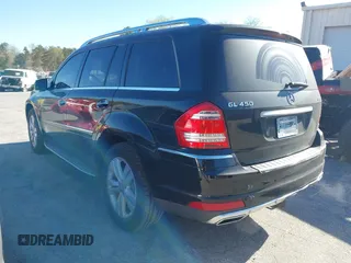 2012 Mercedes-Benz GL-Class GL 450 with VIN 4JGBF7BE2CA795653, listed as a IAAI auction lot 41847301 with 144,137 mi miles. Bid and sale history available at carsss.com. Image 3.