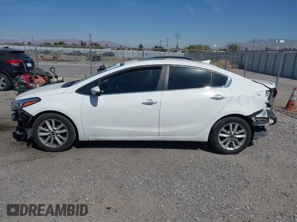 2017 Kia Forte S with VIN 3KPFL4A71HE086412, listed as a IAAI auction lot 42004117 with 201,729 mi miles and . Bid and sale history available at DreamBid. Image 15.