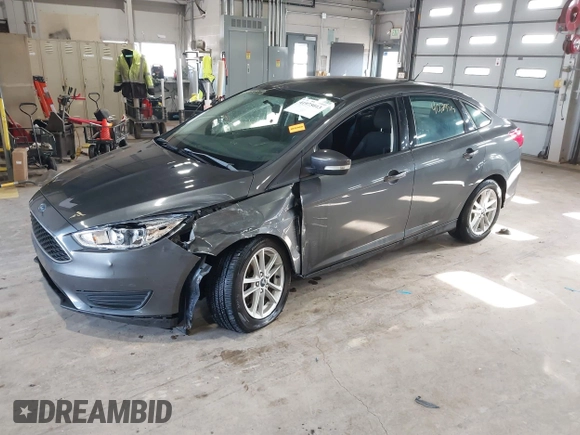 2017 Ford Focus SE with VIN 1FADP3F29HL220440, listed as a IAAI auction lot 41975013 with 40,295 mi miles and . Bid and sale history available at DreamBid. Image 2.