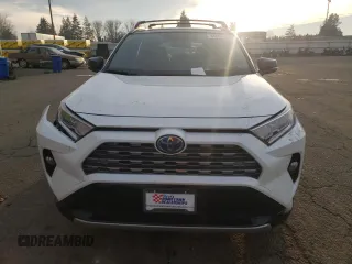 2020 Toyota RAV4 Hybrid XSE with VIN JTMEWRFV5LD541943, listed as a Copart auction lot 84005364 with 88,435 mi miles and Salvage title. Bid and sale history available at DreamBid. Image 5.