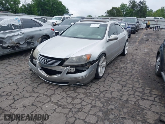 2005 Acura RL с VIN JH4KB16595C017766, выставлен на аукционе IAAI как лот 42209022 с пробегом 225 862 миль миль и . История ставок и продаж доступна на DreamBid. Изображение 17.