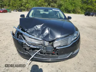 2014 Lincoln MKZ z VIN 3LN6L2JK4ER805421, wystawiony jako Copart lot #56781605 z przebiegiem 90 061 mil mil oraz Tytuł czysty. Historia ofert i sprzedaży dostępna na DreamBid. Obrazek 5.