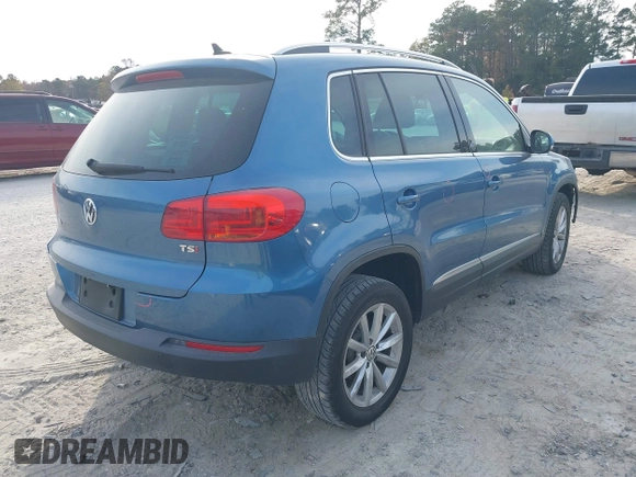 2017 Volkswagen Tiguan Wolfsburg Edition with VIN WVGRV7AX6HW504313, listed as a IAAI auction lot 40950812 with 149,884 mi miles and . Bid and sale history available at DreamBid. Image 4.