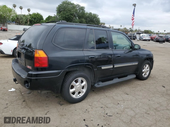 2004 GMC Envoy SLE with VIN 1GKDT13S442155788, listed as a Copart auction lot 50270135 with 164,271 mi miles and Salvage Title. Bid and sale history available at carsss.com. Image 3.