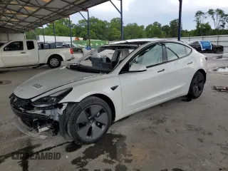 2023 Tesla Model 3 с VIN 5YJ3E1EA8PF471458, выставлен на аукционе Copart как лот 60953035 с пробегом 26 773 миль миль и Списание • Salvage title. История ставок и продаж доступна на DreamBid. Изображение 1.