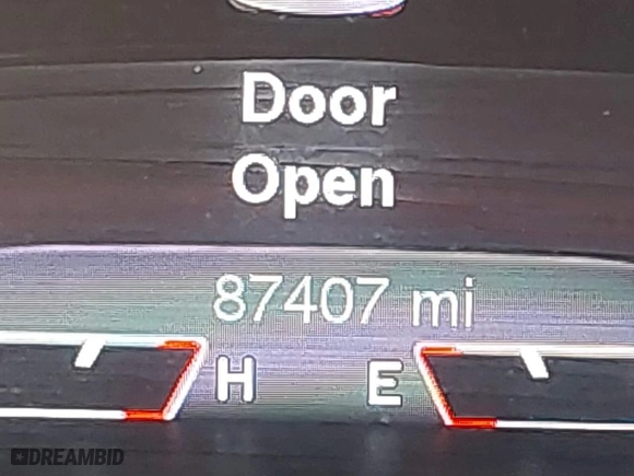 2015 Jeep Cherokee Trailhawk with VIN 1C4PJMBS8FW702624, listed as a IAAI auction lot 41828049 with 87,407 mi miles. Bid and sale history available at carsss.com. Image 16.