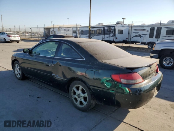 2000 Toyota Solara SE with VIN 2T1CF22P1YC312427, listed as a Copart auction lot 72077714 with 288,269 mi miles and Salvage Title. Bid and sale history available at carsss.com. Image 2.