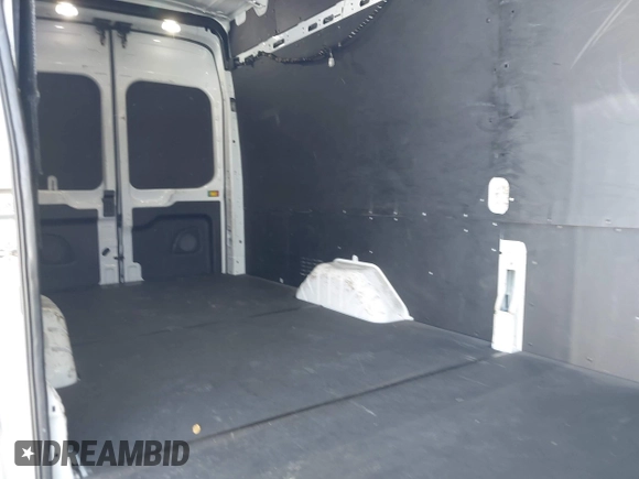 2022 Ford Transit Cargo with VIN 1FTBW3X89NKA69141, listed as a IAAI auction lot 41980864 with 102,721 mi miles and . Bid and sale history available at DreamBid. Image 8.
