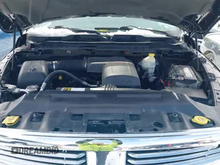 2015 Ram 1500 Outdoorsman z VIN 1C6RR7GGXFS606208, wystawiony jako IAAI lot #41660434 z przebiegiem 135 087 mil mil oraz . Historia ofert i sprzedaży dostępna na DreamBid. Obrazek 10.