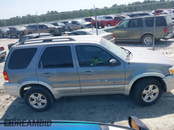 2007 Ford Escape Hybrid with VIN 1FMCU49H87KB34041, listed as a IAAI auction lot 42313413 with Not provided miles and . Bid and sale history available at DreamBid. Image 5.