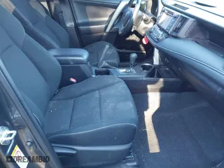 2016 Toyota RAV4 XLE with VIN 2T3WFREV0GW266691, listed as a IAAI auction lot 41804023 with 77,000 mi miles. Bid and sale history available at carsss.com. Image 5.