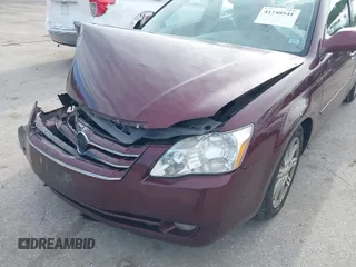 2007 Toyota Avalon XL with VIN 4T1BK36B37U173085, listed as a IAAI auction lot 41748541 with 164,021 mi miles. Bid and sale history available at carsss.com. Image 6.
