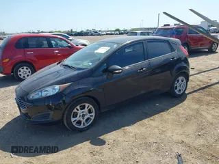 2015 Ford Fiesta SE with VIN 3FADP4EJXFM190262, listed as a IAAI auction lot 41997760 with 81,522 mi miles. Bid and sale history available at carsss.com. Image 2.