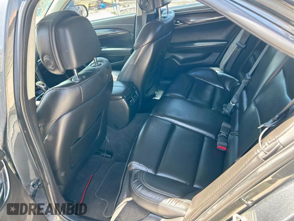 2014 Cadillac ATS Standard AWD z VIN 1G6AG5RX4E0109116, wystawiony jako Copart lot #58604795 z przebiegiem 169 817 mil mil oraz Szkoda całkowita • Salvage title. Historia ofert i sprzedaży dostępna na DreamBid. Obrazek 6.