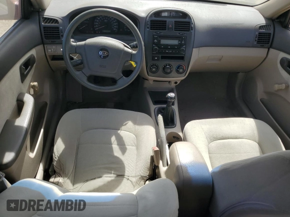 2005 Kia Spectra LX z VIN KNAFE121355162932, wystawiony jako Copart lot #56292625 z przebiegiem 92 828 mil mil oraz Szkoda całkowita • Salvage title. Historia ofert i sprzedaży dostępna na DreamBid. Obrazek 8.