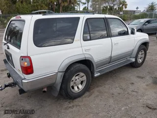 1998 Toyota 4Runner with VIN JT3GN87R7W0085869, listed as a IAAI auction lot 41328631 with 175,255 mi miles. Bid and sale history available at carsss.com. Image 4.